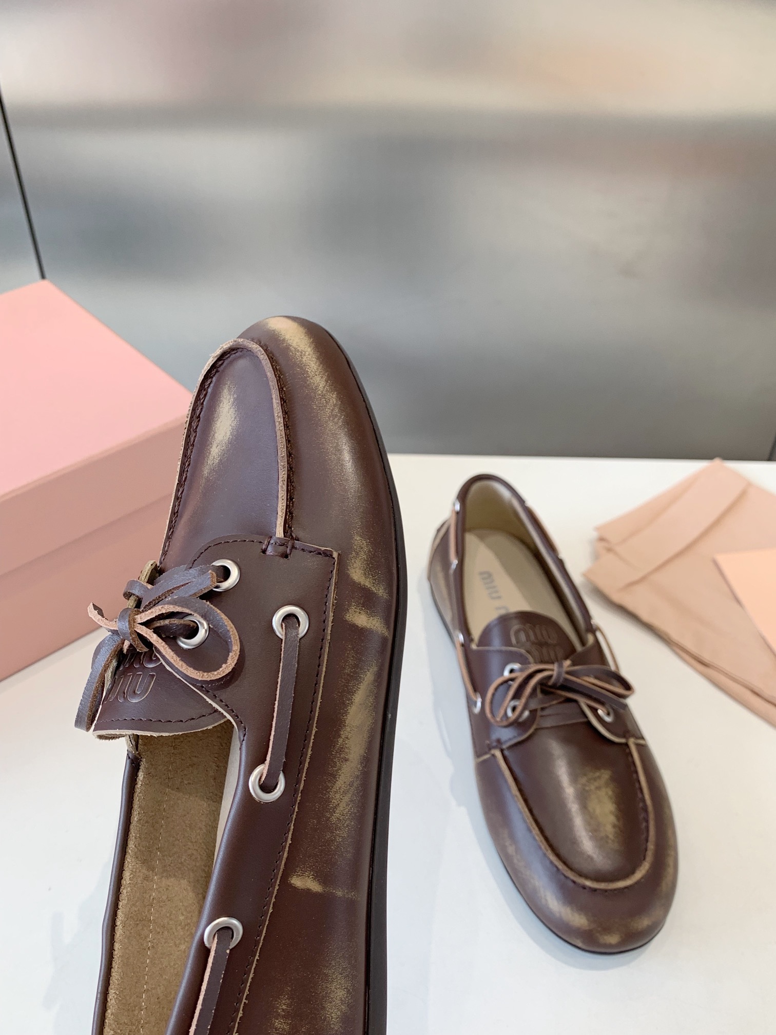 Bagsaaa Miu Miu Unlined bleached leather boat shoes brown