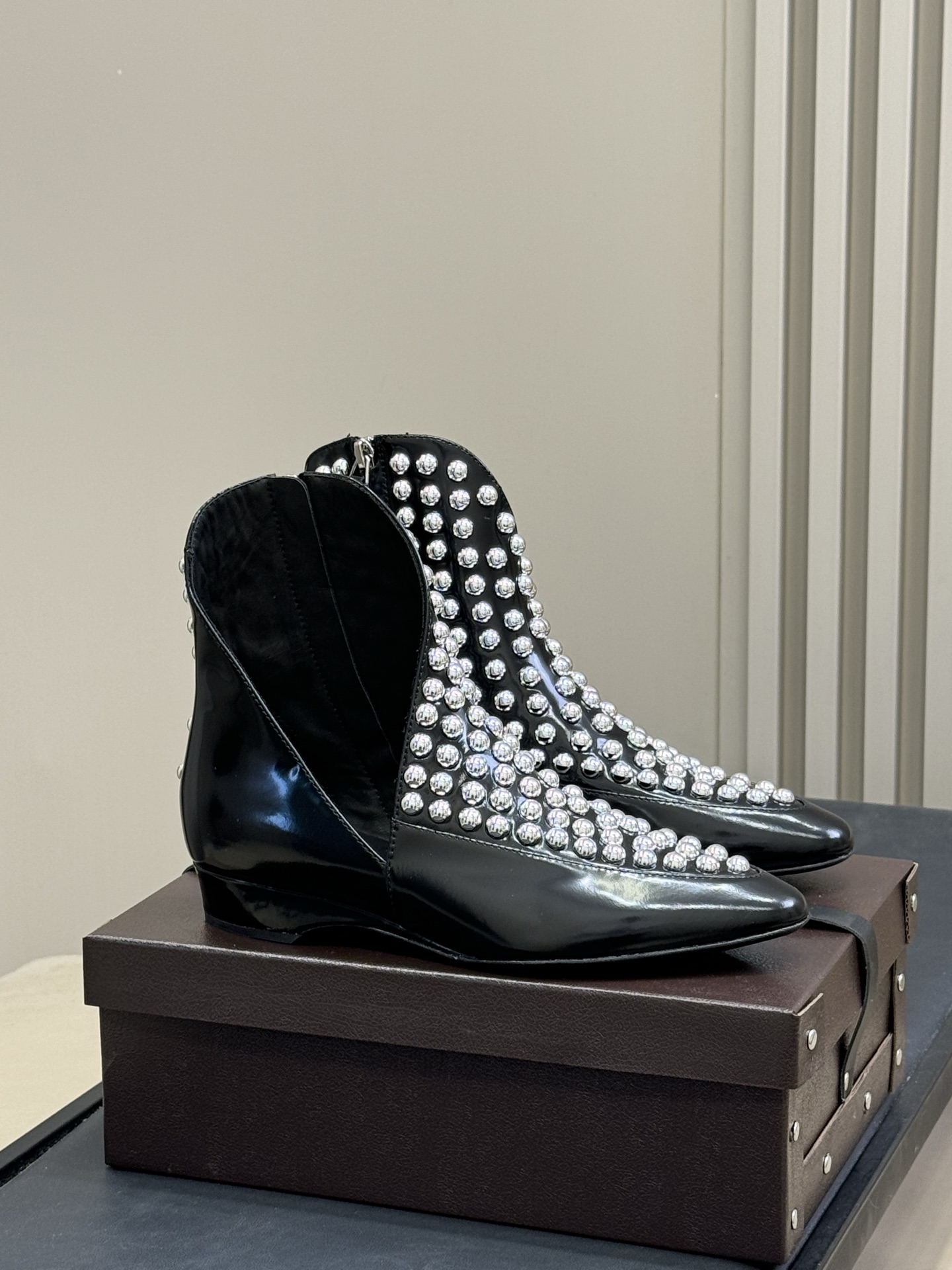 Bagsaaa Alaia Asymetric Ankle Boots In Glossy Calfskin With Studs