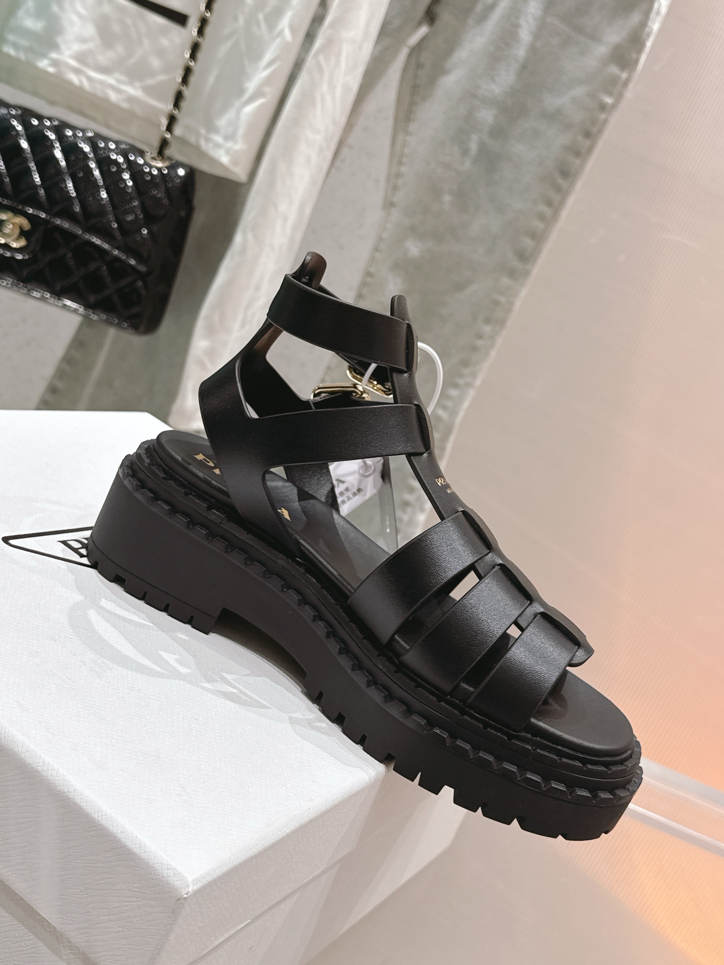 Bagsaaa Pra*a Leather sandals with ankle straps 1X924N black