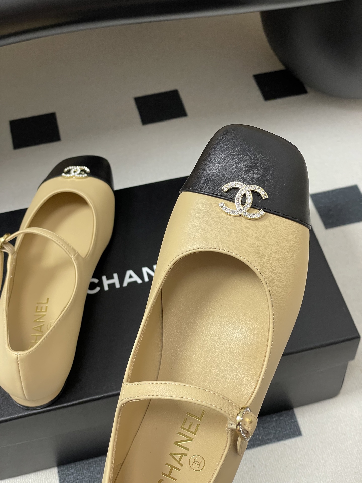 Bagsaaa Ch**el black & beige Mary Jane flats with crystal-embellished CC