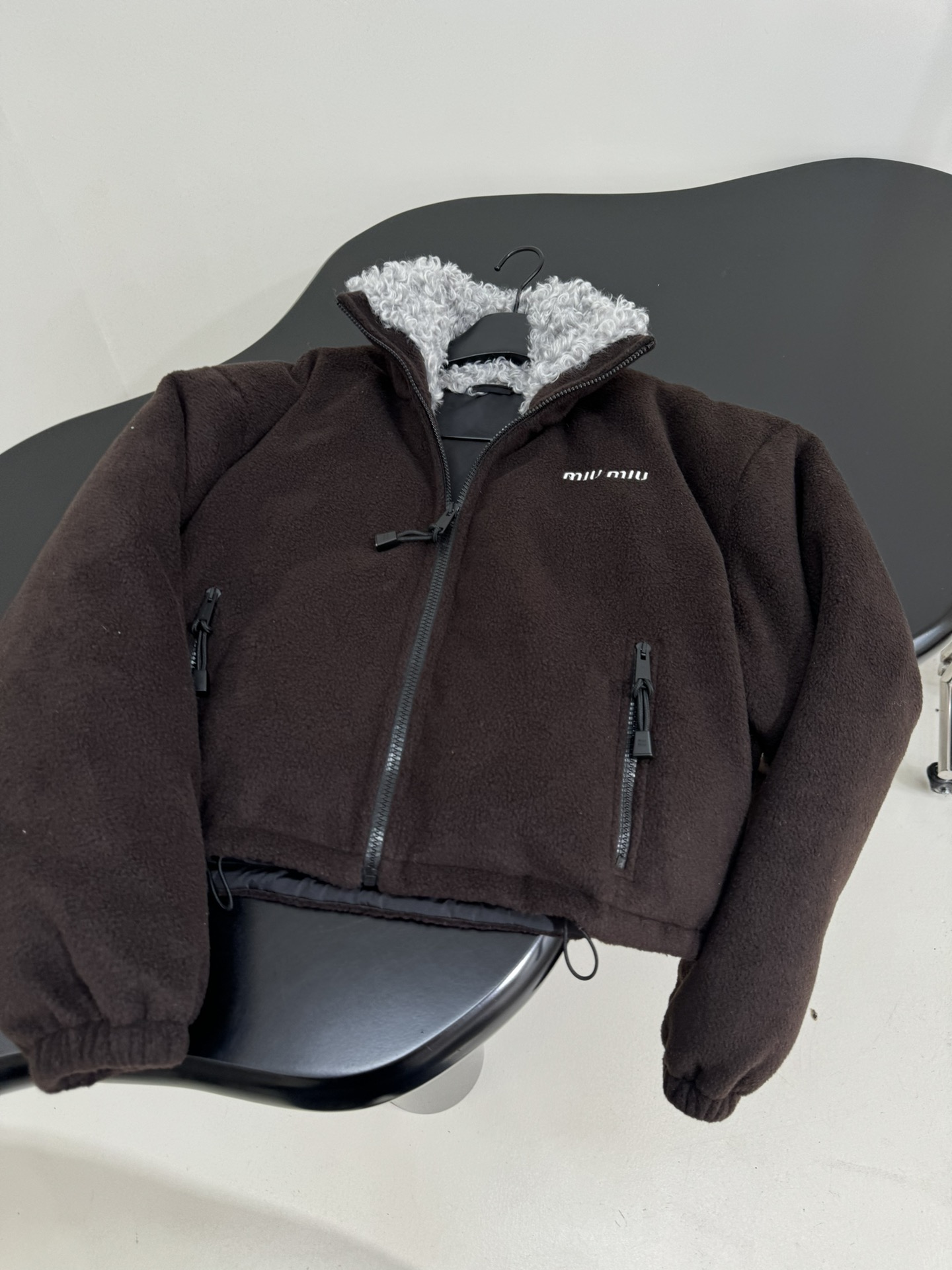 Bagsaaa Miu Miu fleece down jacket in ebony with a fur-lined collar dark brown