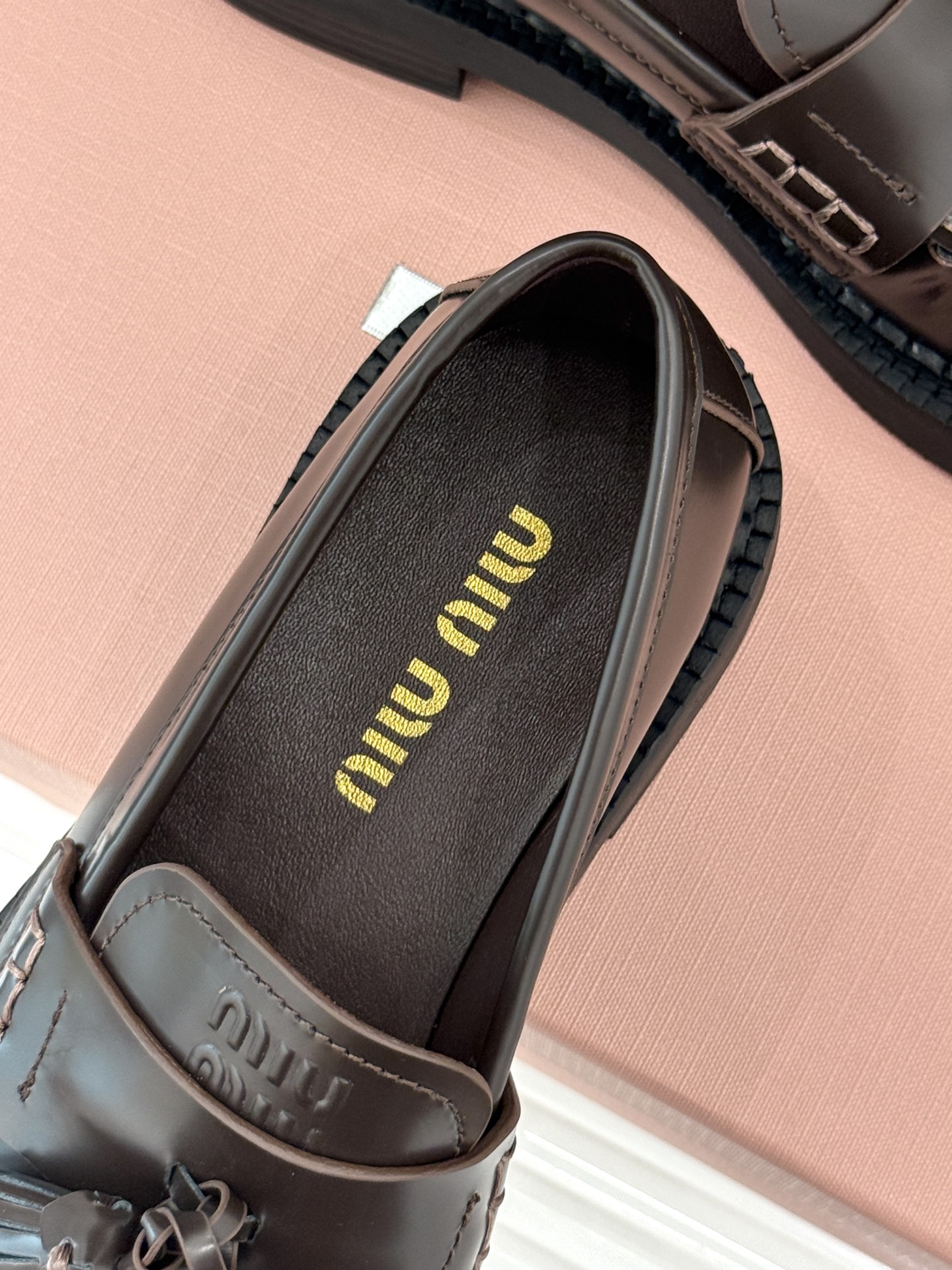 Bagsaaa Miu Miu polished leather tassel loafers in dark brown