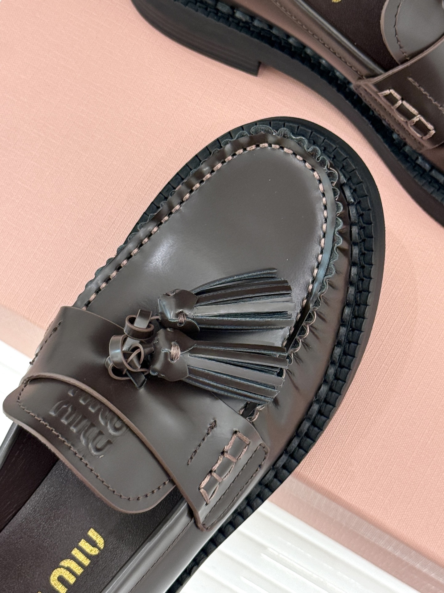 Bagsaaa Miu Miu polished leather tassel loafers in dark brown
