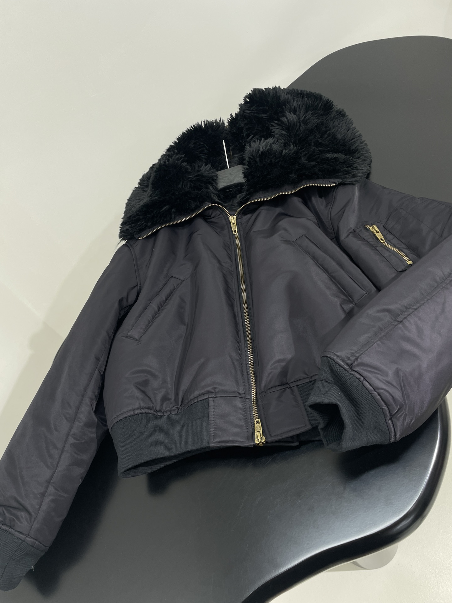 Bagsaaa Ba1en*iaga hooded bomber jacket with a faux fur collar black