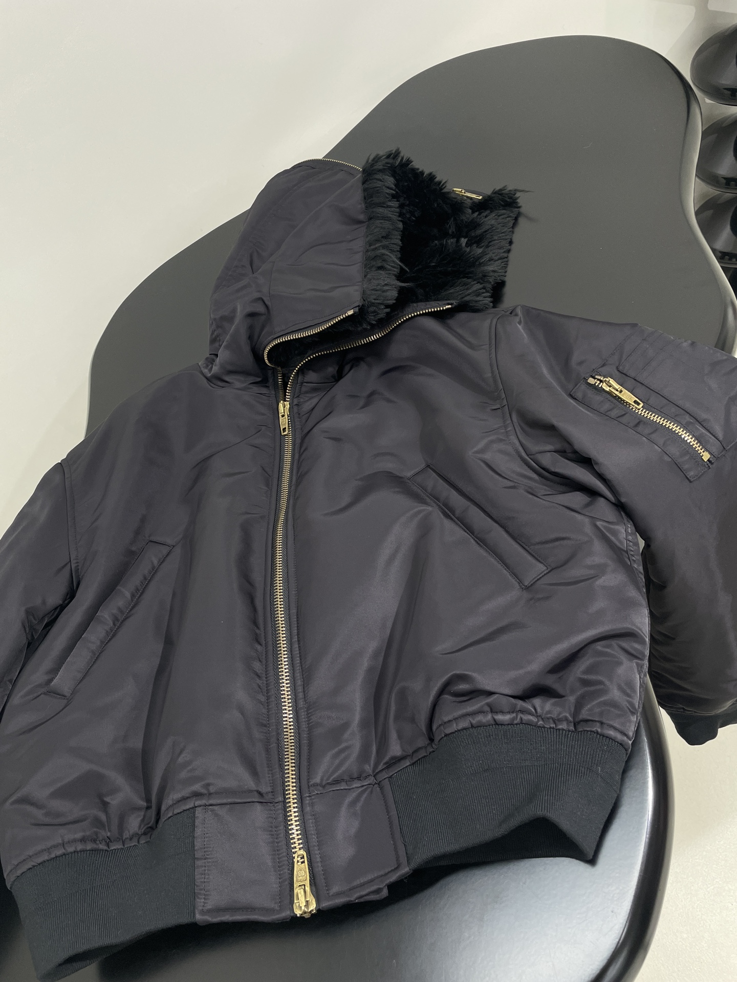 Bagsaaa Ba1en*iaga hooded bomber jacket with a faux fur collar black