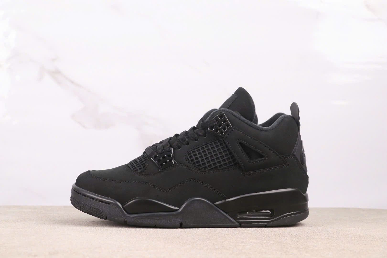 Bagsaaa Air Jordan 4 Retro 'Black Cat' sneaker in the all-black