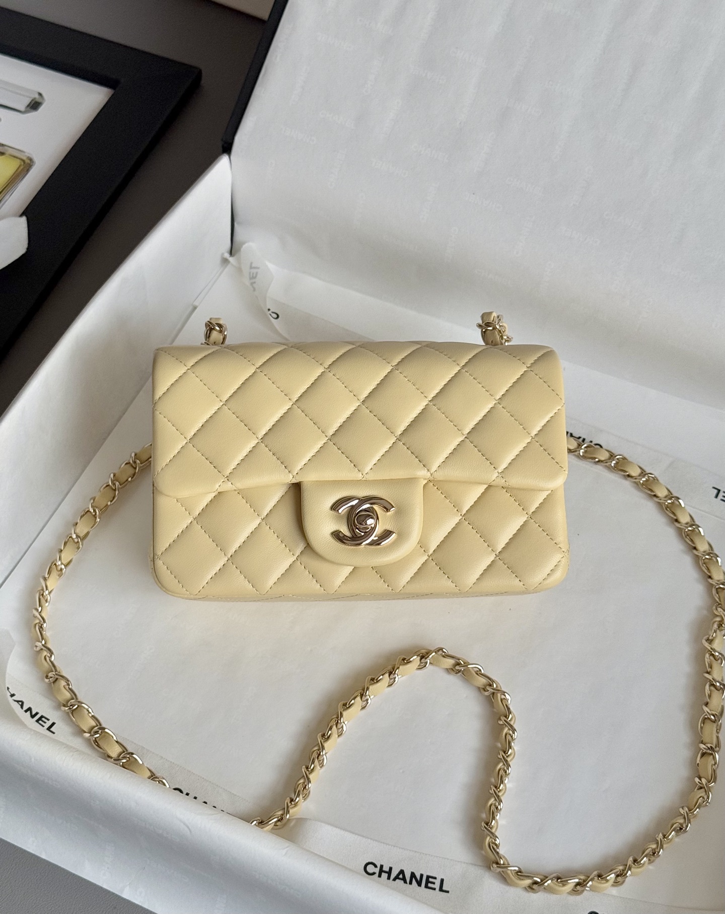 Ch**el Mini Classic Flap handbag in light yellow - 20cm