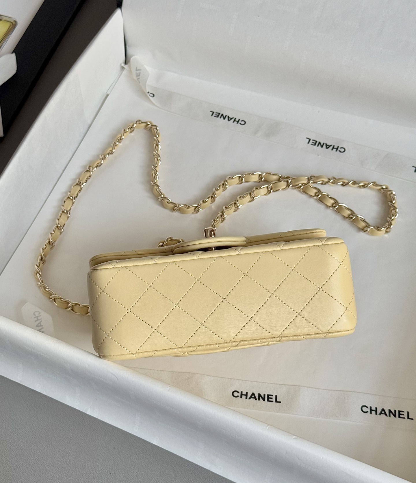 Ch**el Mini Classic Flap handbag in light yellow - 20cm