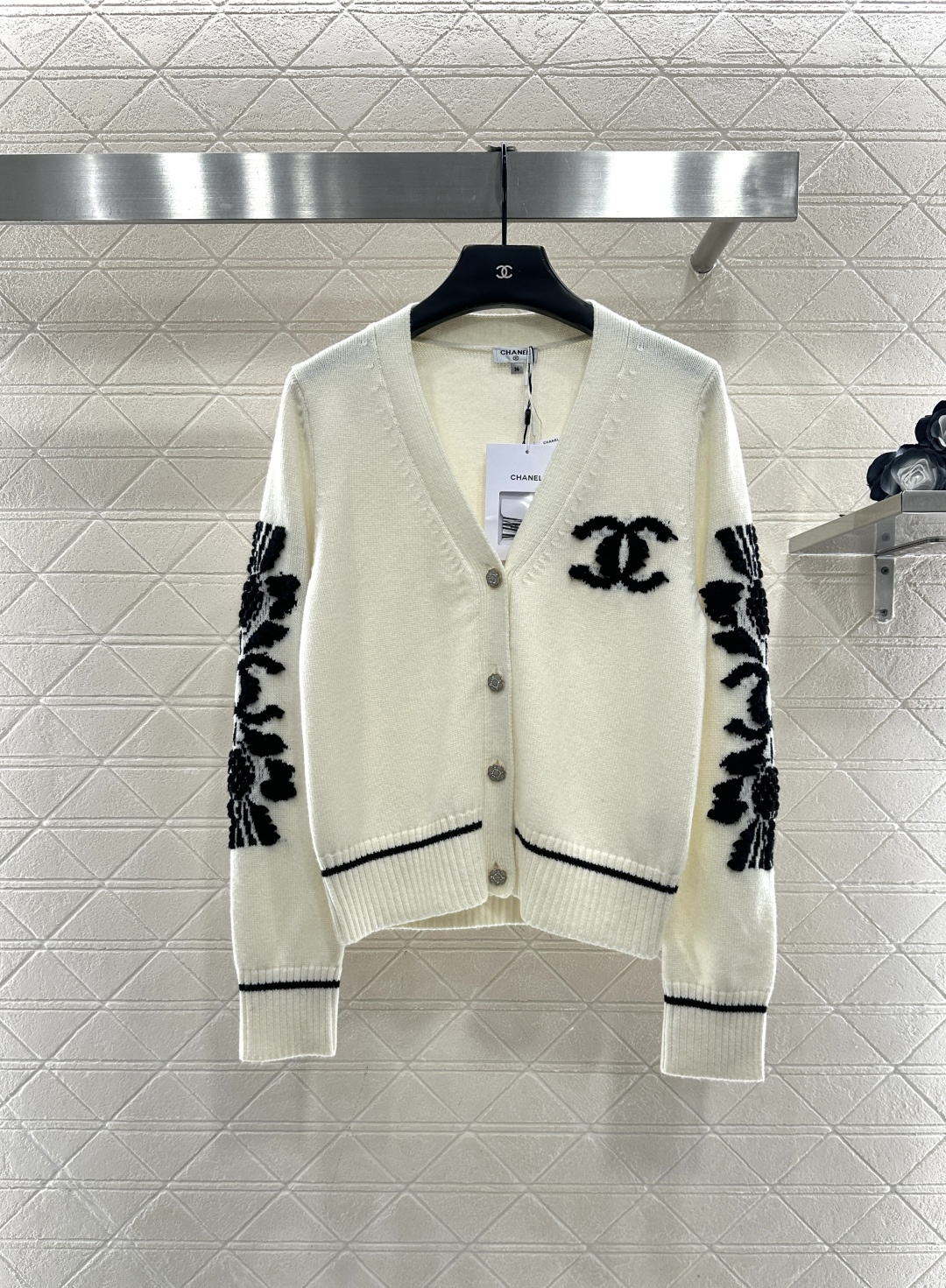 Bagsaaa Ch**el cardigan in white with black floral appliqués