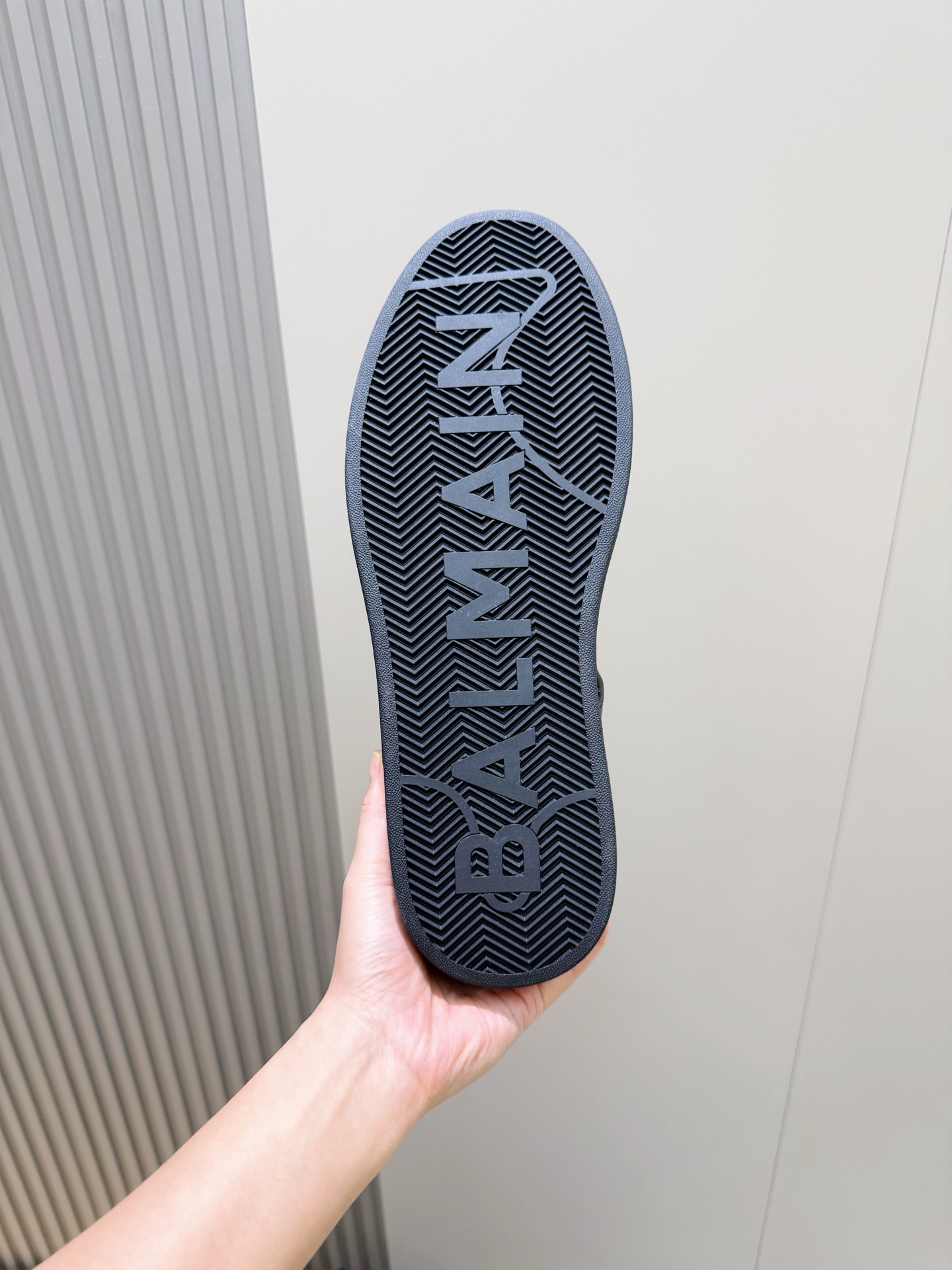 Bagsaaa Balmain black monogram-embossed leather sneakers