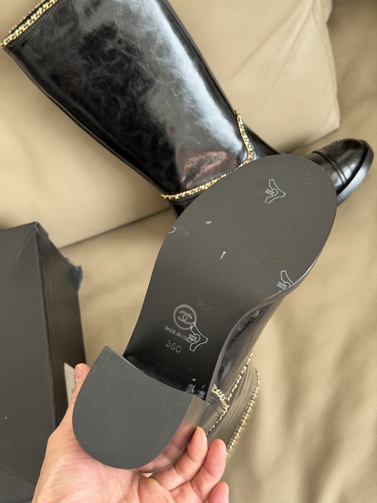 Bagsaaa Ch**el mid-calf boots in black patent leather with cap toes