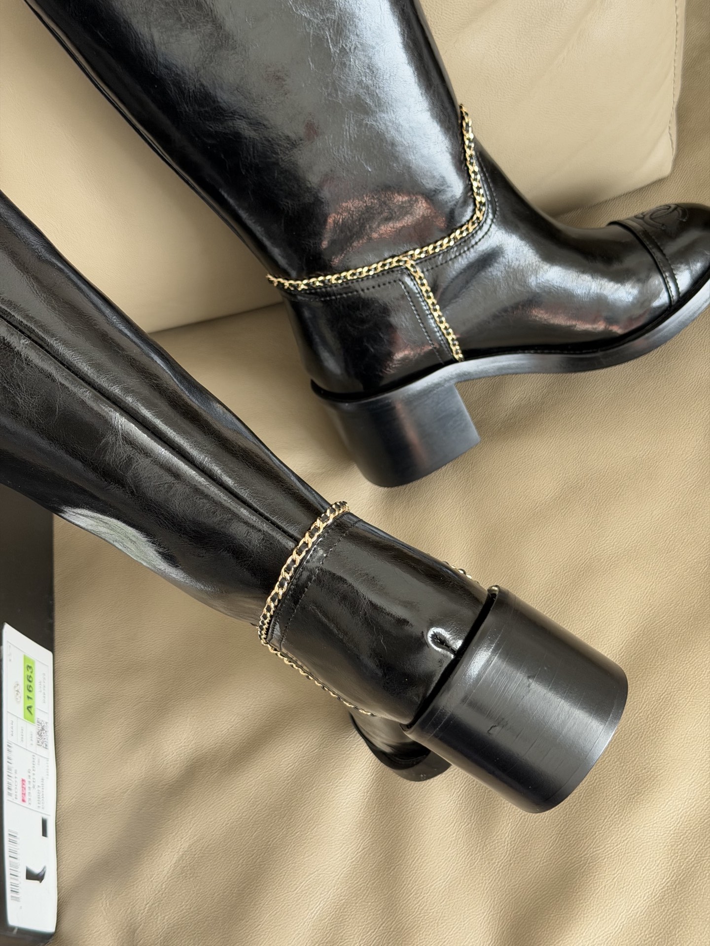 Bagsaaa Ch**el mid-calf boots in black patent leather with cap toes