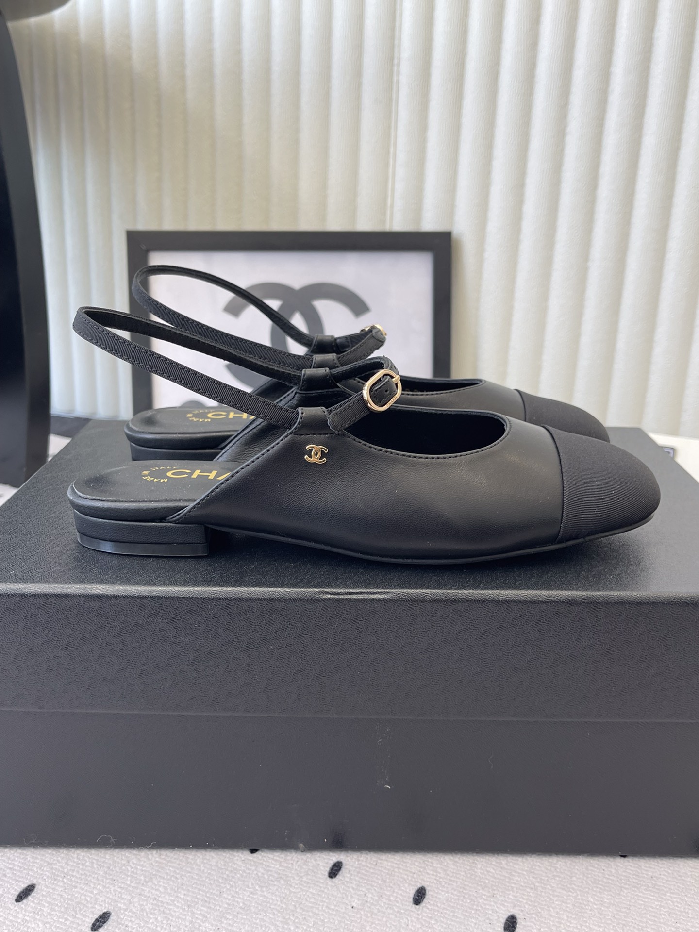 Bagsaaa Ch**el leather Mary Jane flats in black with an ankle strap