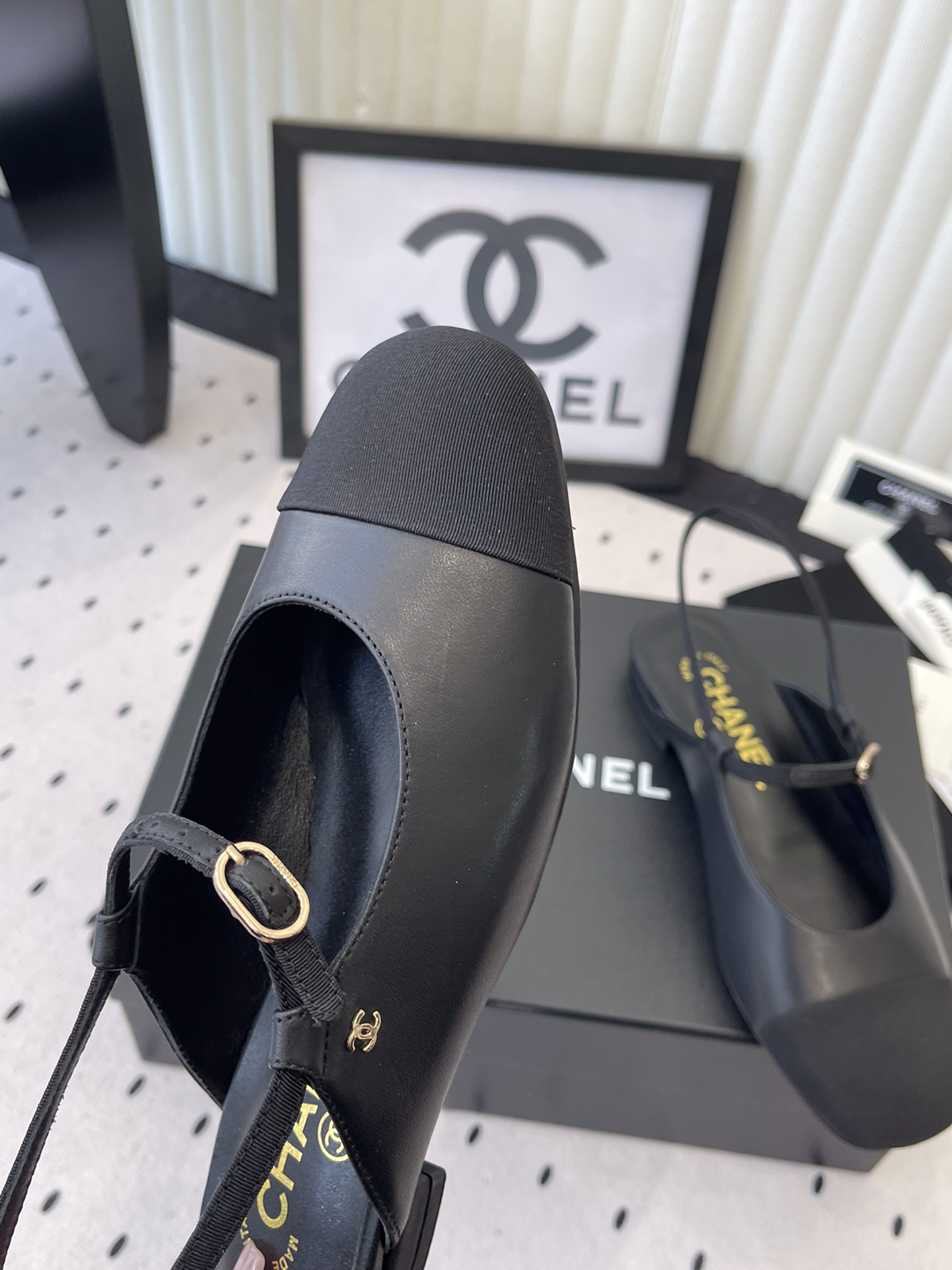 Bagsaaa Ch**el leather Mary Jane flats in black with an ankle strap