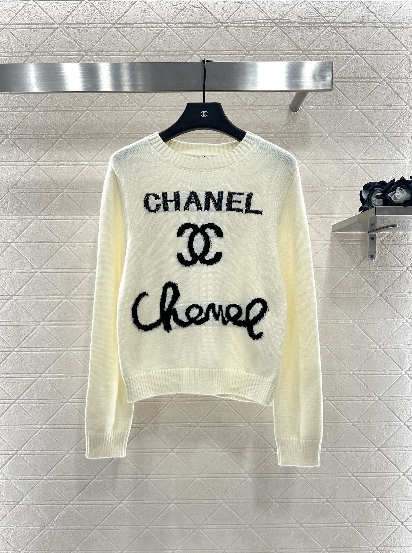 Bagsaaa Ch**el knit sweater in white with a black logo 