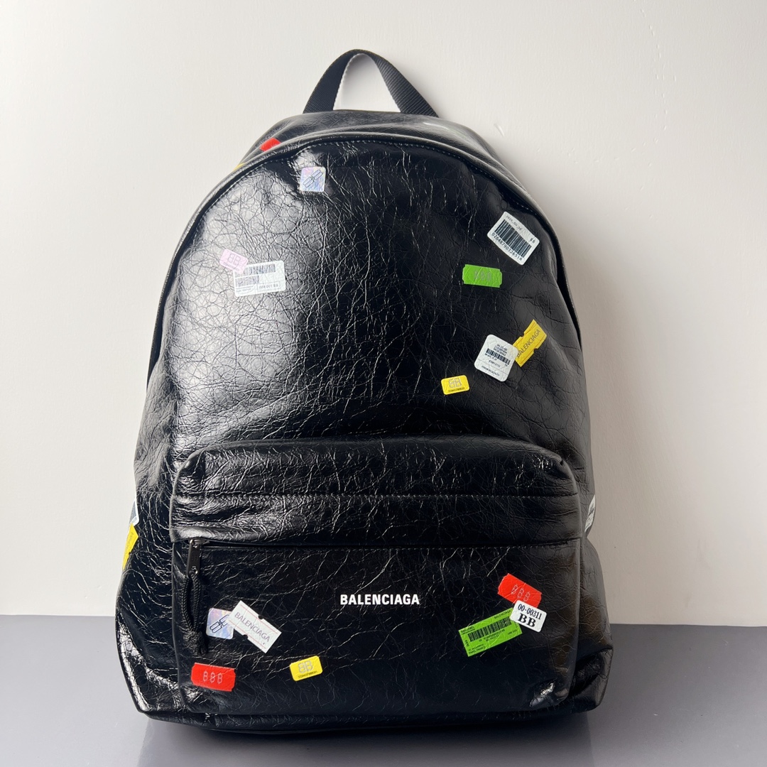 Bagsaaa Ba1en*iaga Explorer Backpack in black Arena lambskin with printed stickers - 47cm