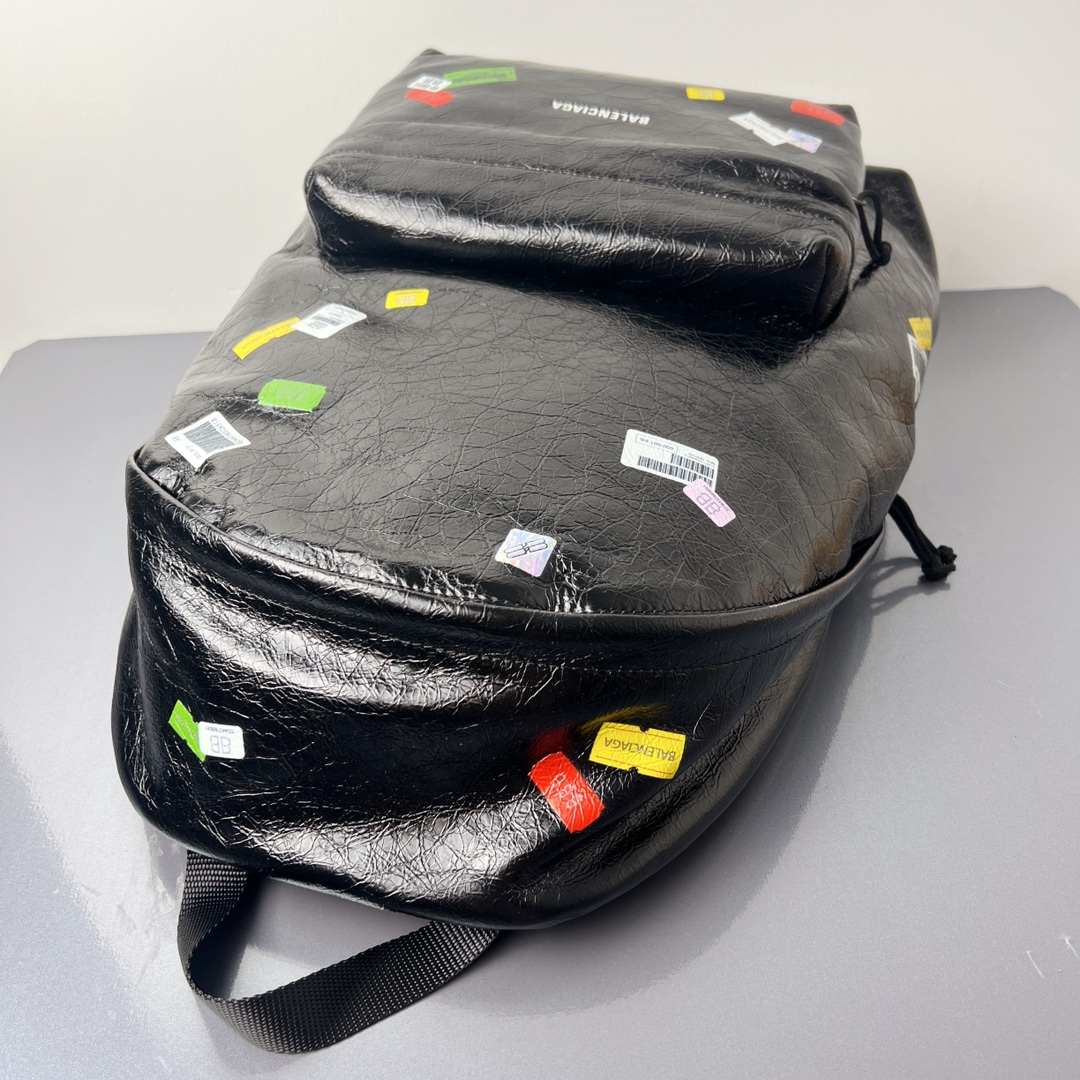Bagsaaa Ba1en*iaga Explorer Backpack in black Arena lambskin with printed stickers - 47cm