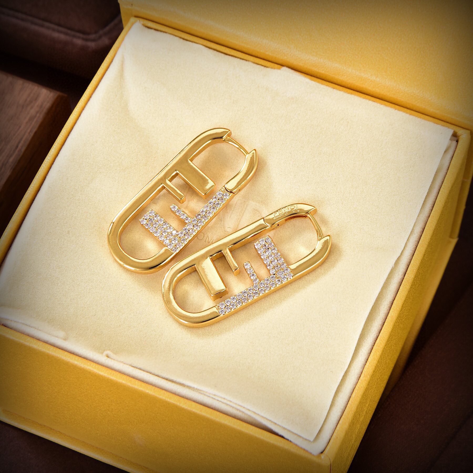 Bagsaaa F**di O'Lock earrings in gold-finish metal with white crystals