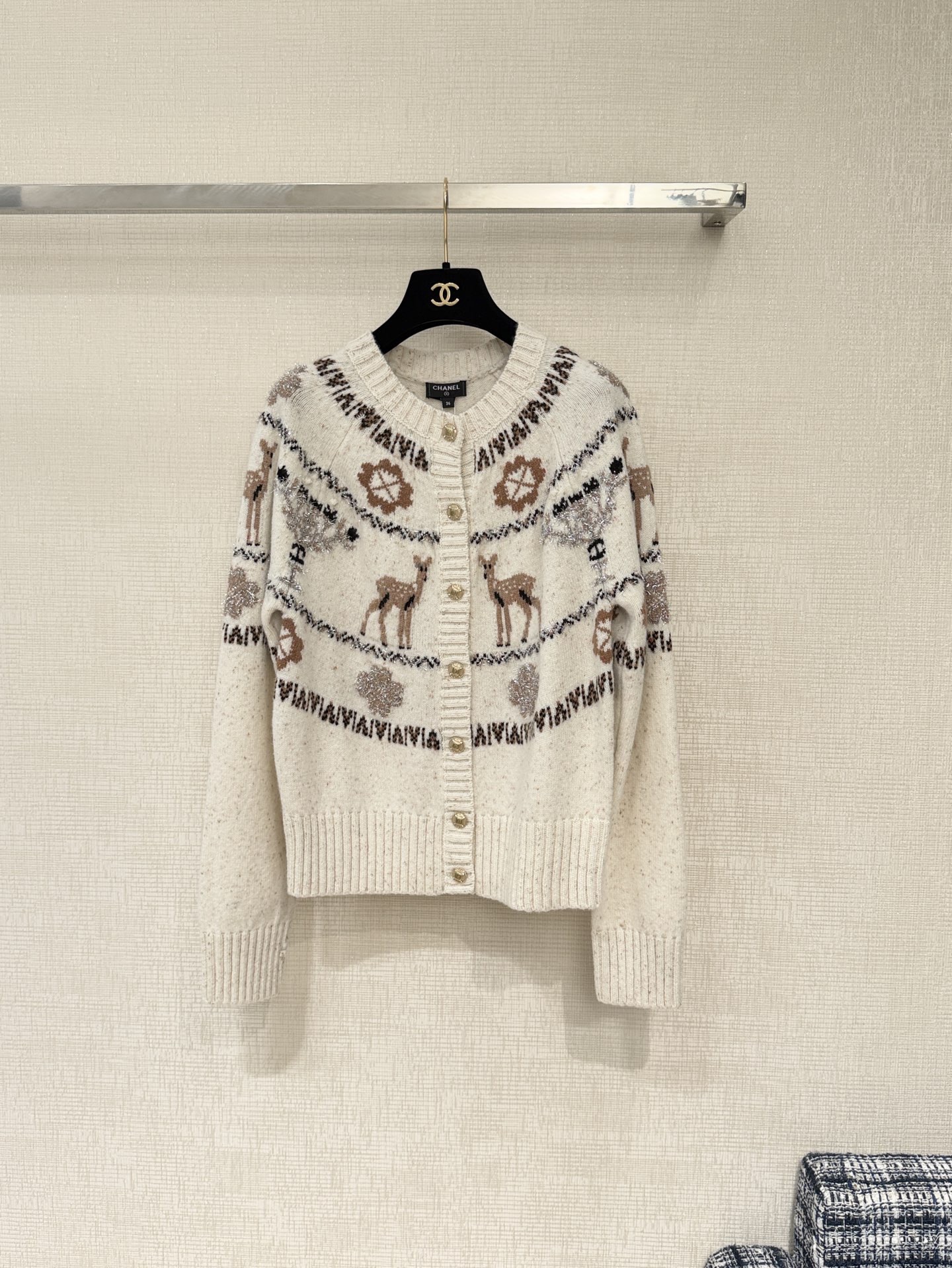 Bagsaaa Ch**el cardigan featuring a winter-themed