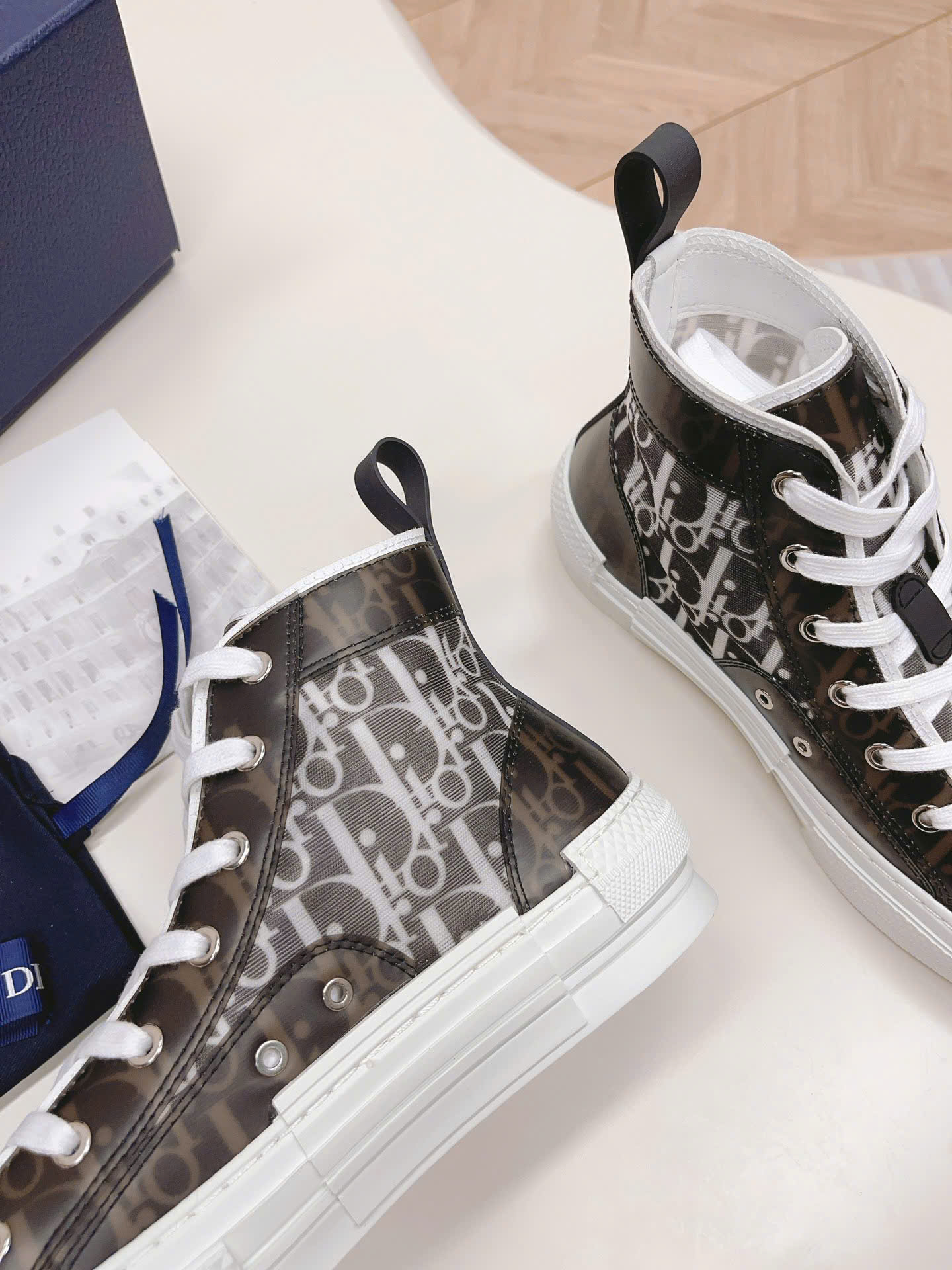 Bagsaaa D10r B23 High-Top Sneaker in black and white D10r Oblique canvas