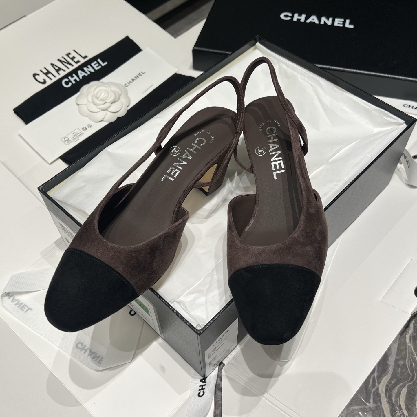 Bagsaaa Ch**el slingback pumps in brown and black suede