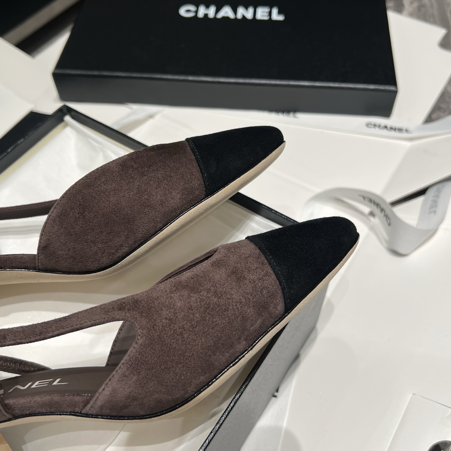 Bagsaaa Ch**el slingback pumps in brown and black suede