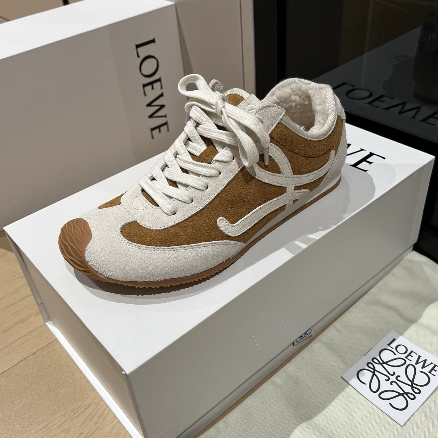 Bagsaaa L0ew* Ballet Runner 2.0 sneakers in a tan and white colorway