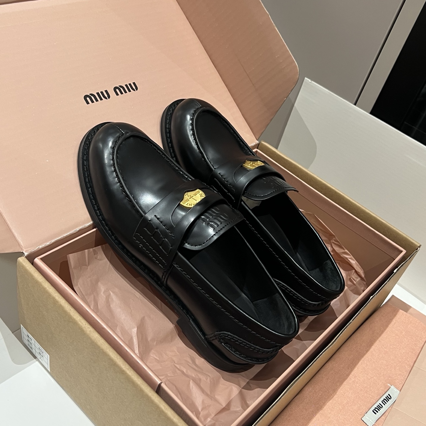 Bagsaaa Miu Miu distressed leather penny loafers black