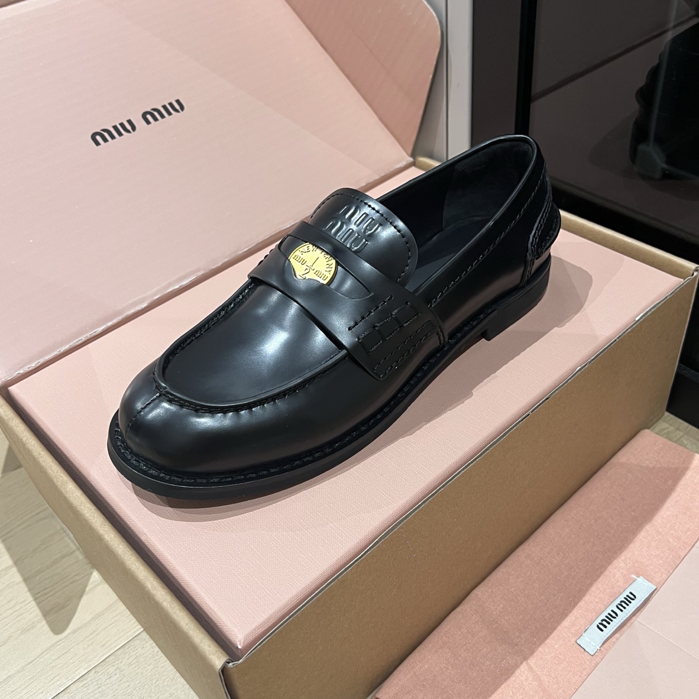 Bagsaaa Miu Miu distressed leather penny loafers black