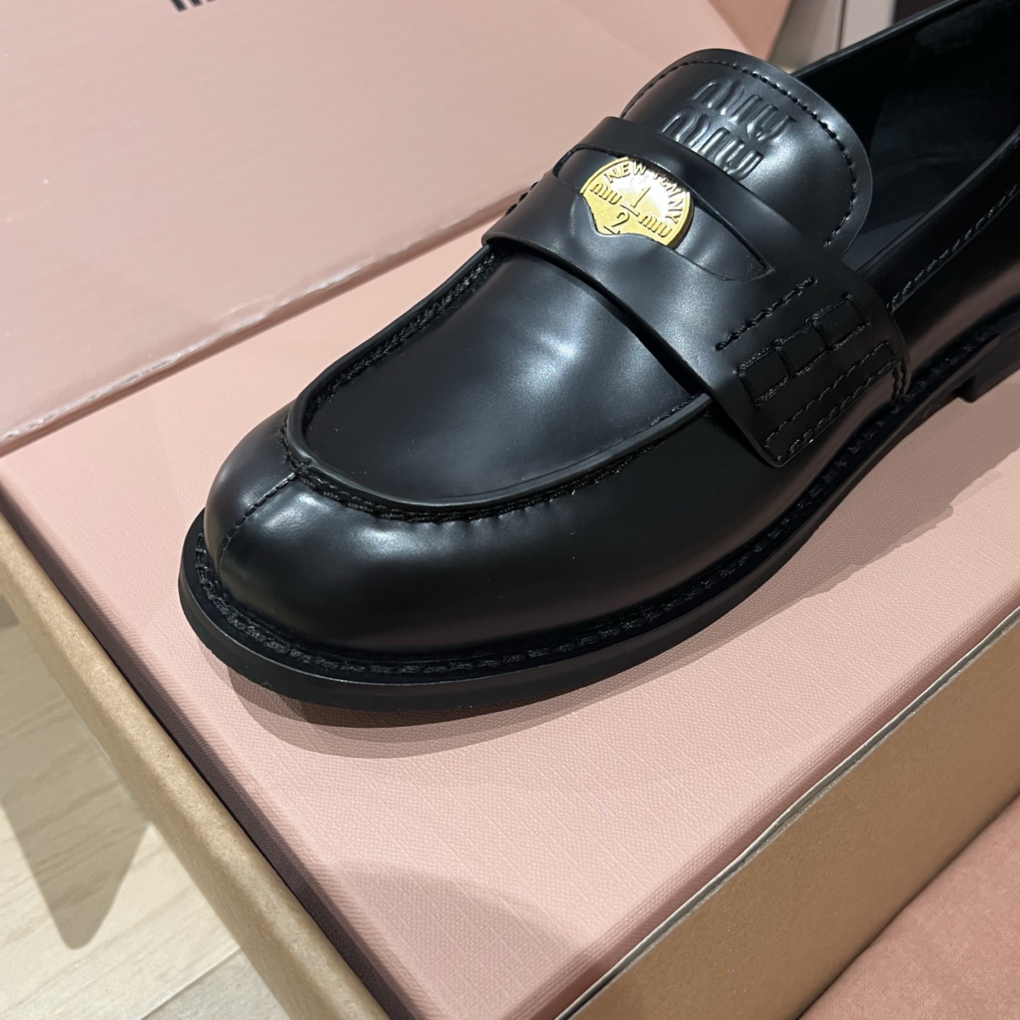 Bagsaaa Miu Miu distressed leather penny loafers black