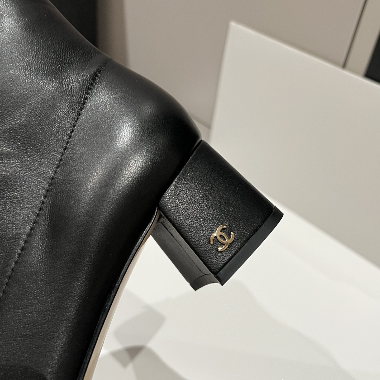 Bagsaaa Ch**el black leather cap-toe ankle boots with zipper