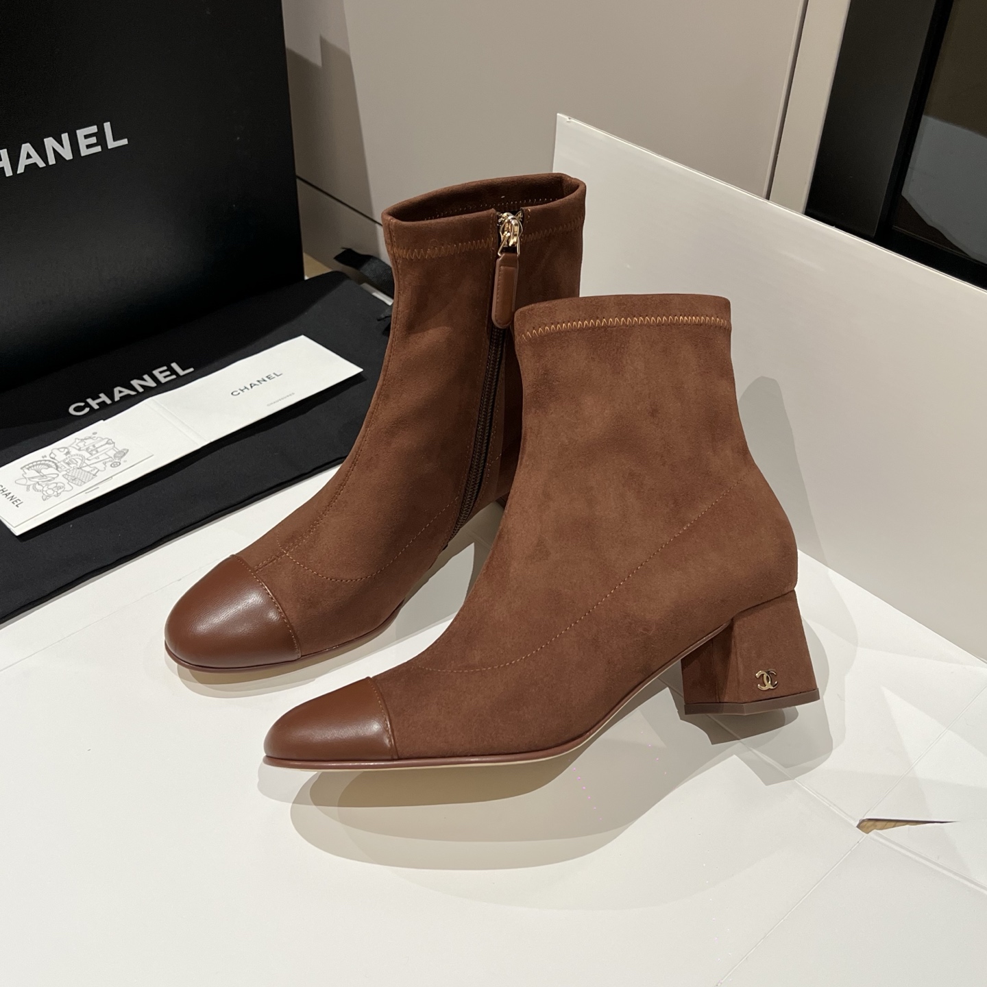 Bagsaaa Ch**el brown suede cap-toe ankle boots with zipper