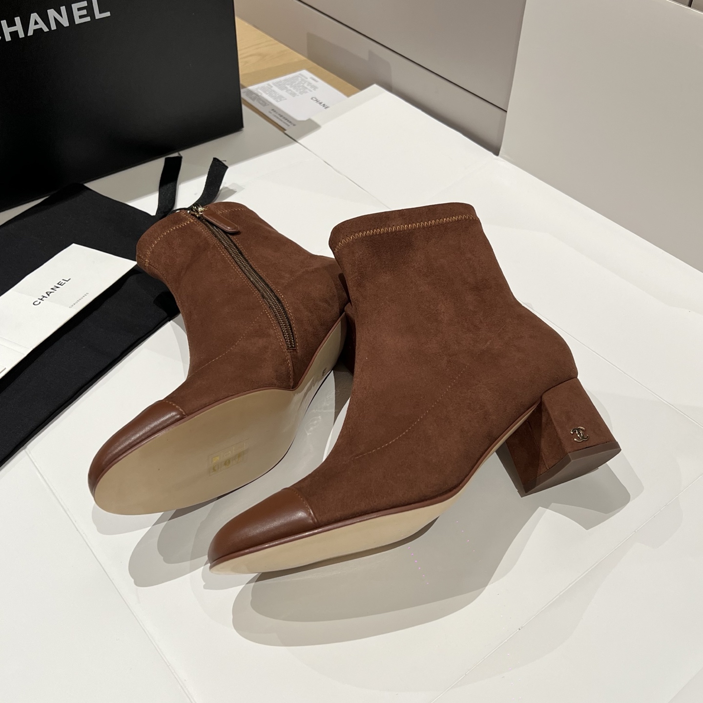 Bagsaaa Ch**el brown suede cap-toe ankle boots with zipper