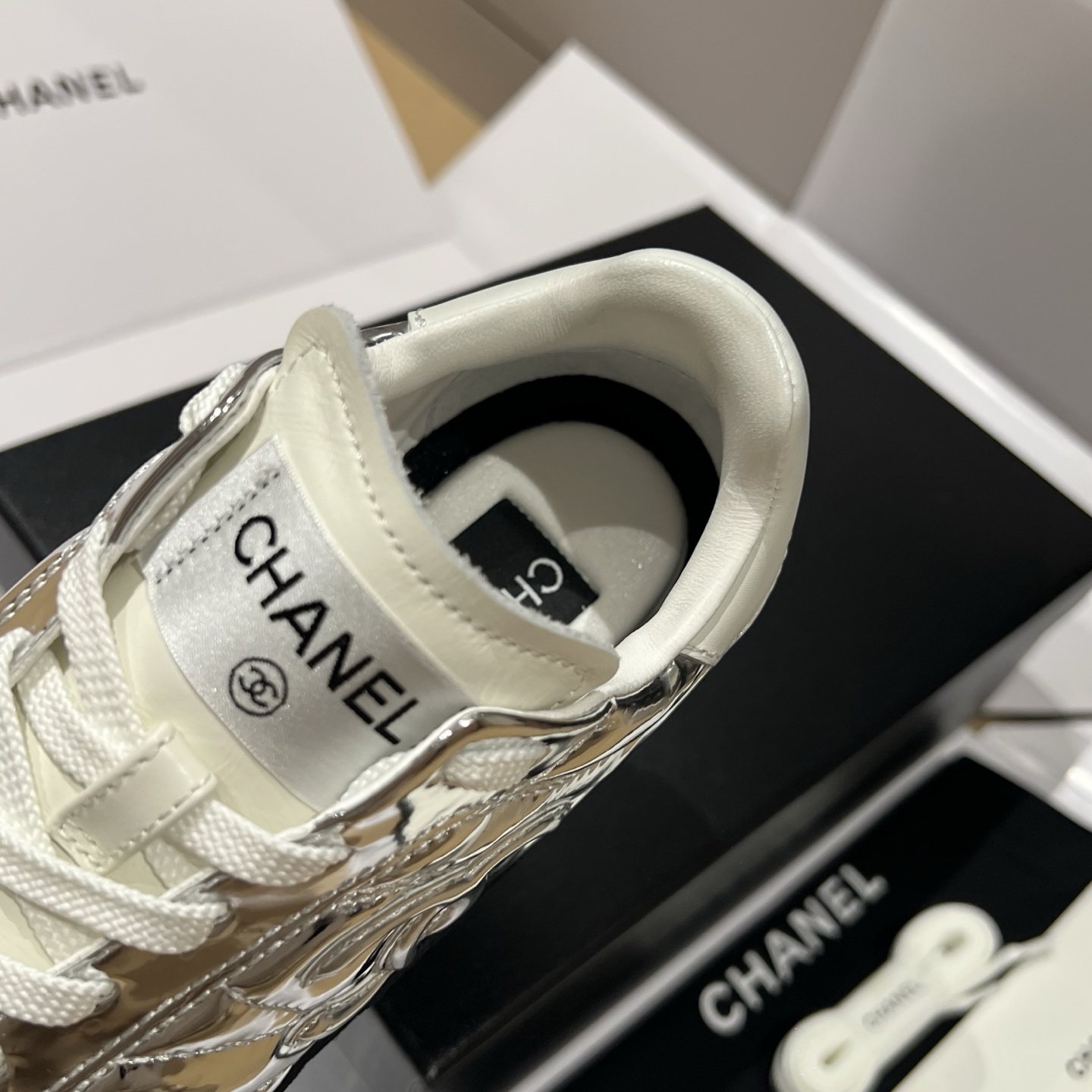 Bagsaaa Ch**el sneakers in silver quilted material and black suede