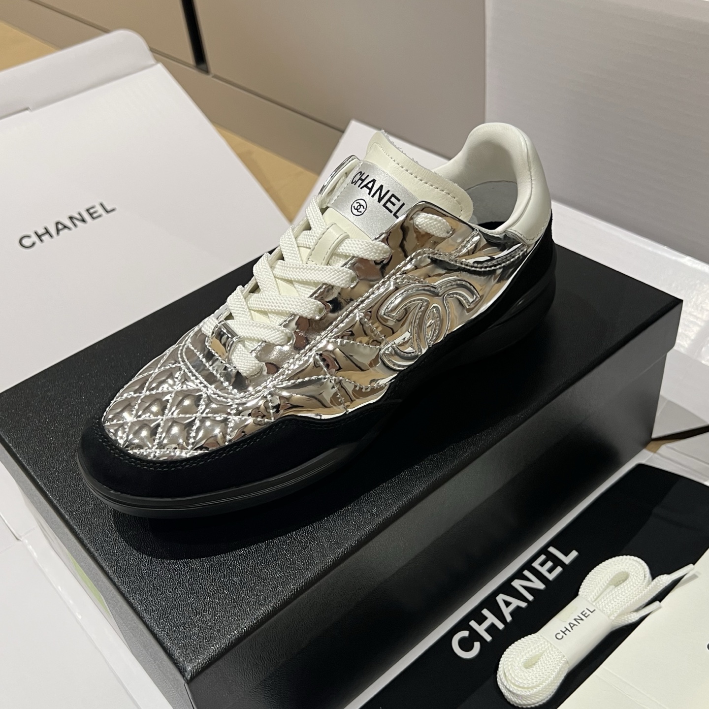 Bagsaaa Ch**el sneakers in silver quilted material and black suede