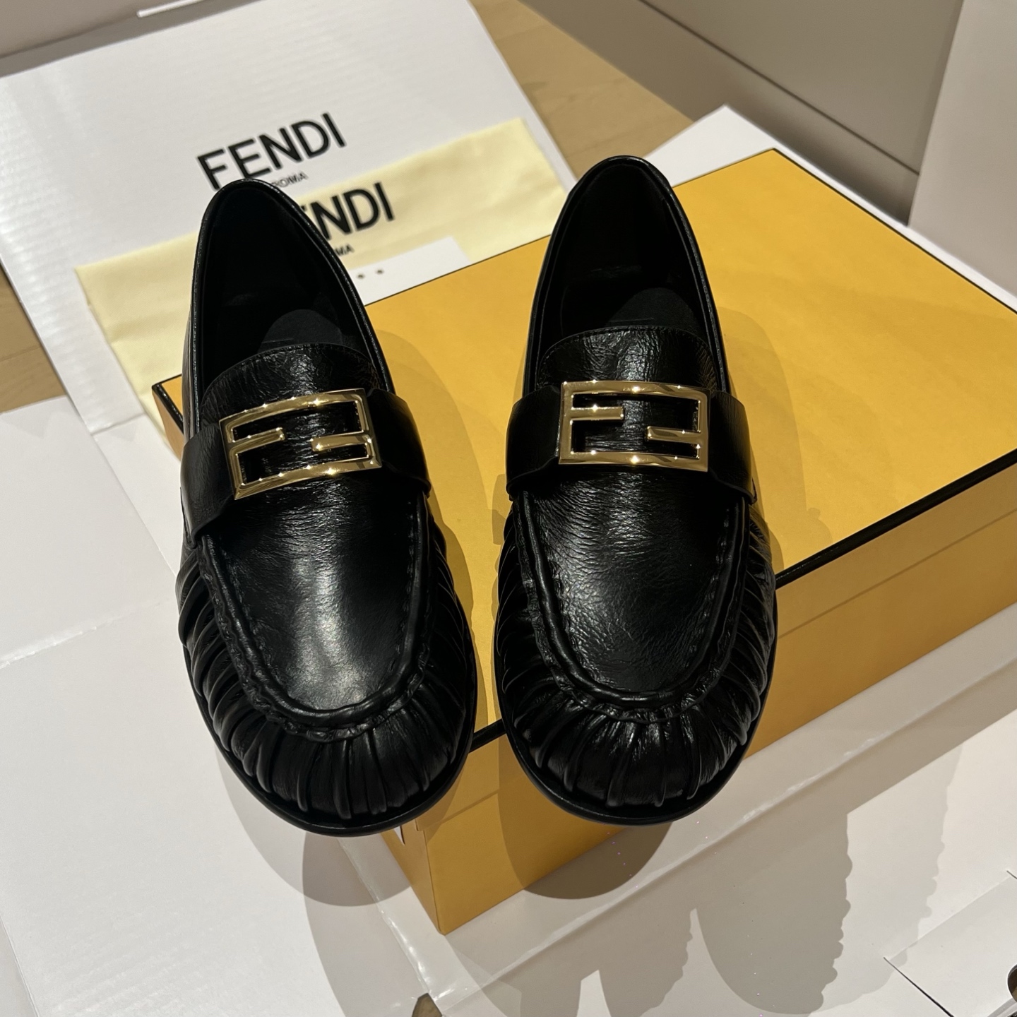Bagsaaa F**di Curled Tray Baguette loafers in black nappa leather