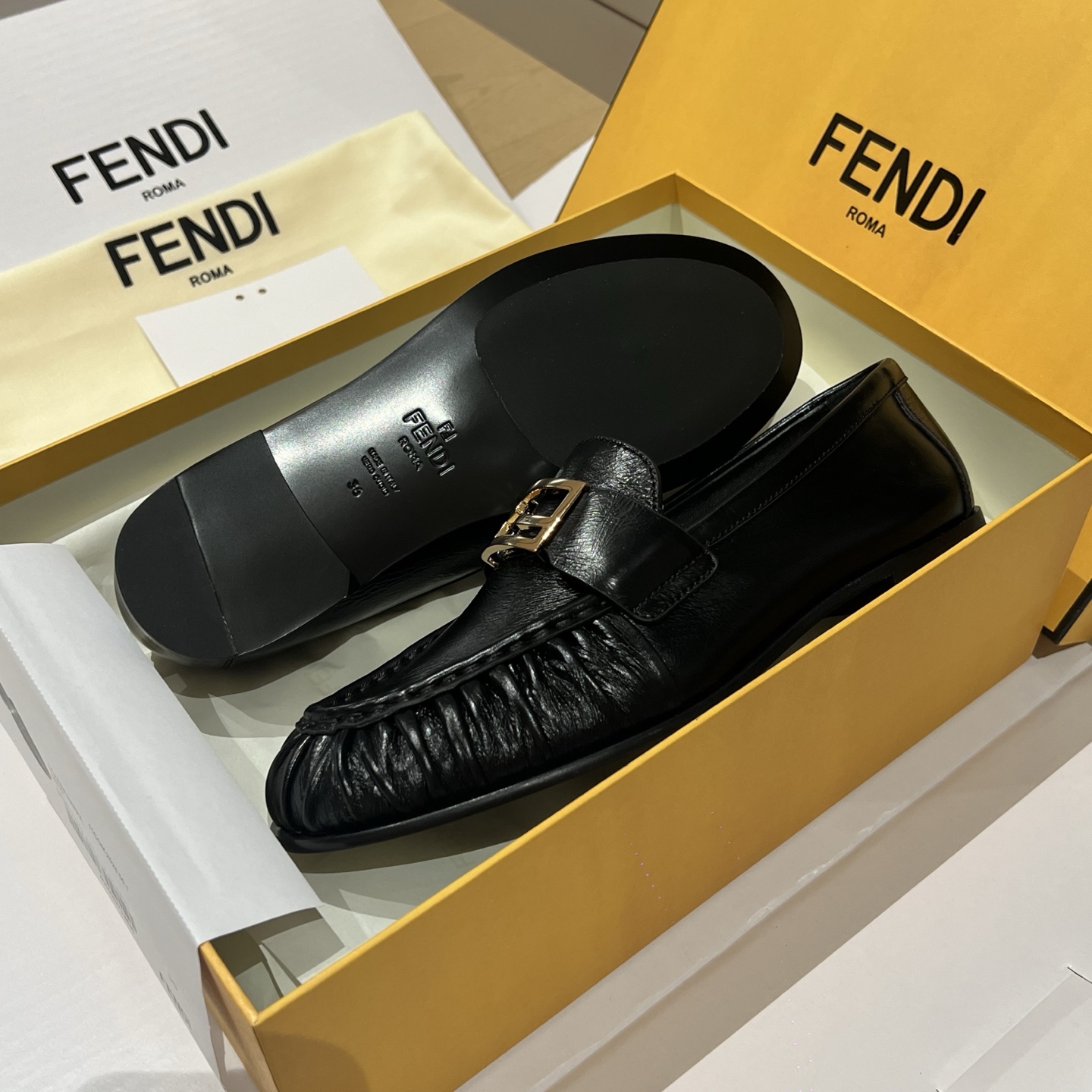Bagsaaa F**di Curled Tray Baguette loafers in black nappa leather