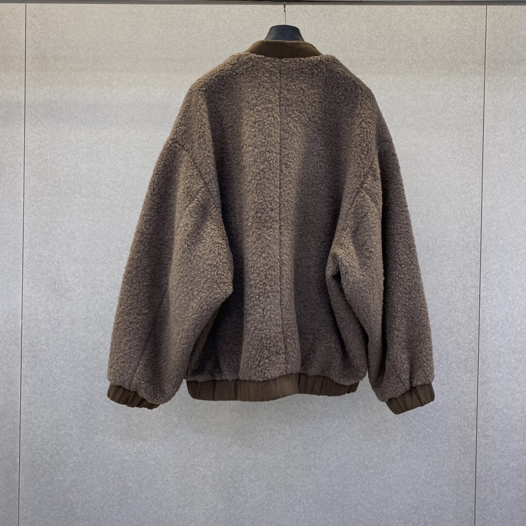 Bagsaaa L0ew* brown sherpa bomber jacket with an Anagram leather patch pocket