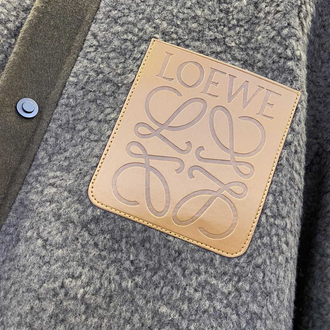 Bagsaaa L0ew* brown sherpa bomber jacket with an Anagram leather patch pocket