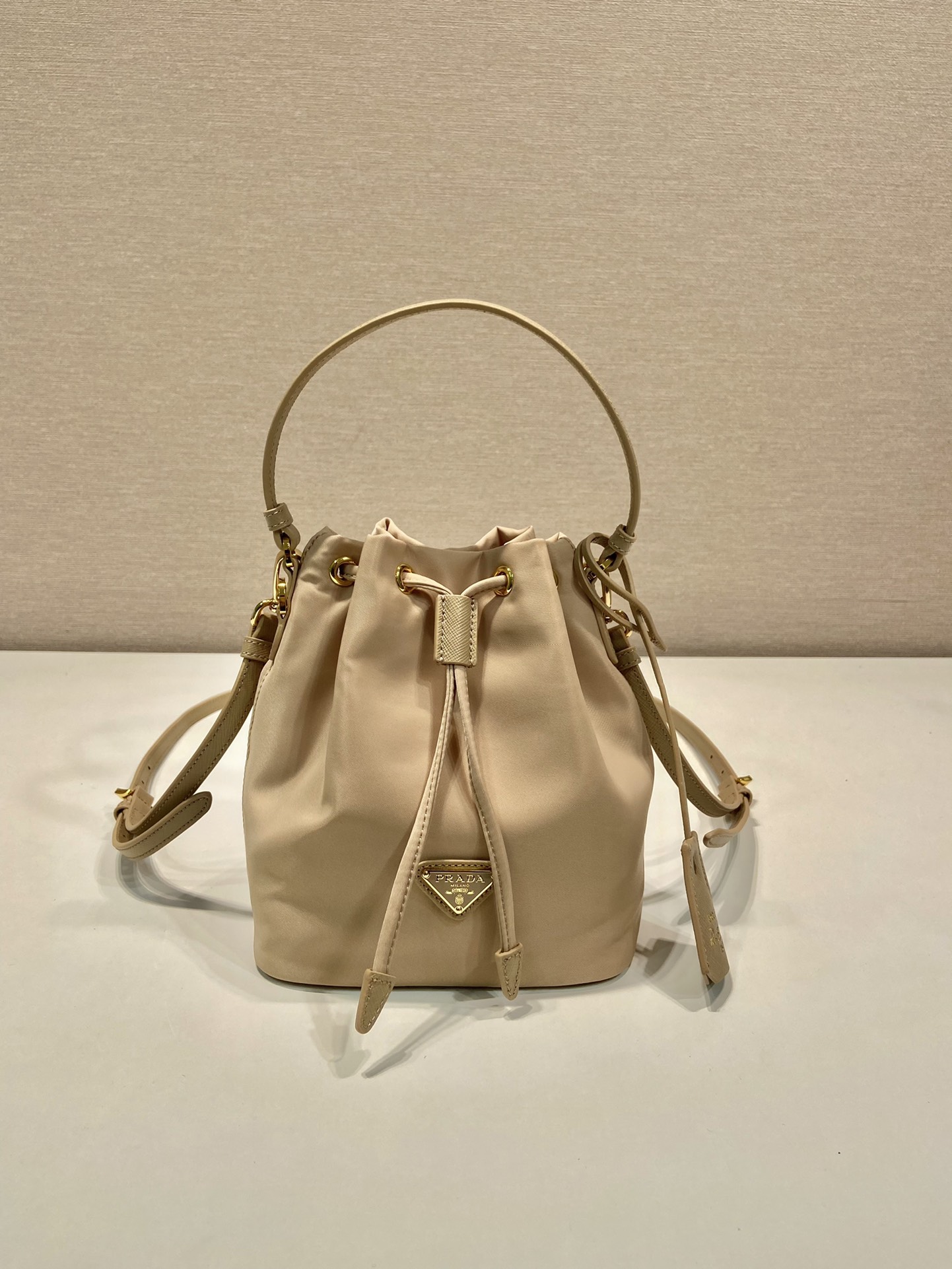 Bagsaaa Pra*a Re-Edition 1978 mini Re-Nylon bag in beige - 19.5cm