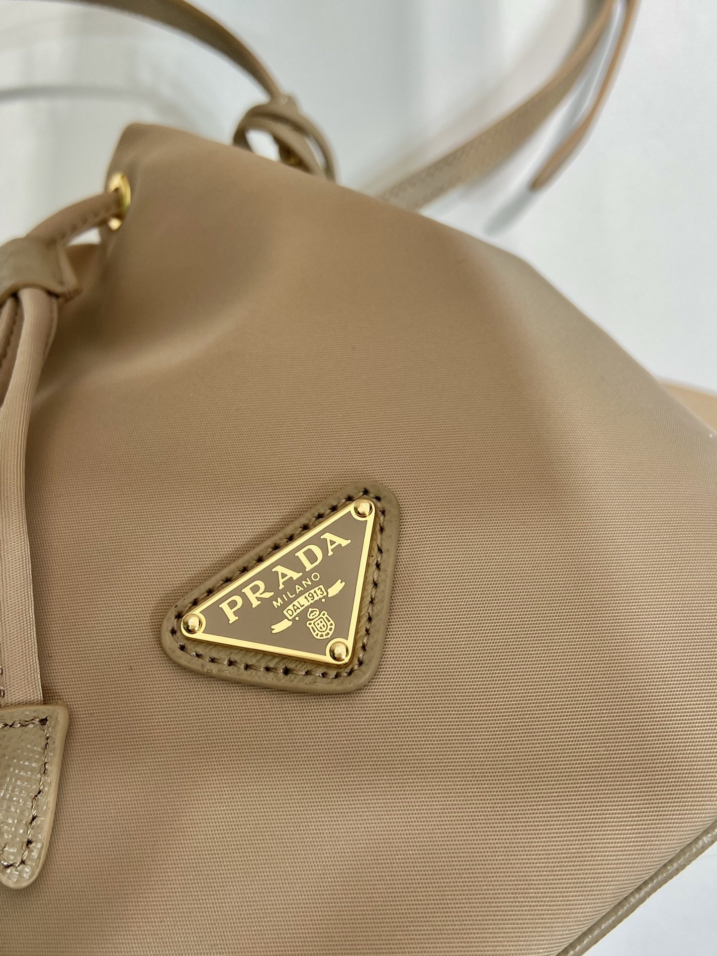 Bagsaaa Pra*a Re-Edition 1978 mini Re-Nylon bag in beige - 19.5cm