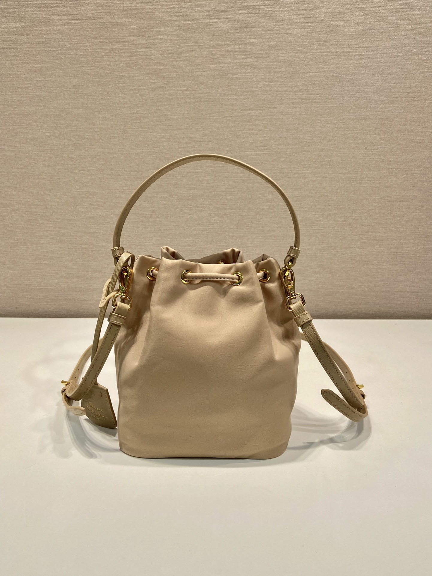 Bagsaaa Pra*a Re-Edition 1978 mini Re-Nylon bag in beige - 19.5cm