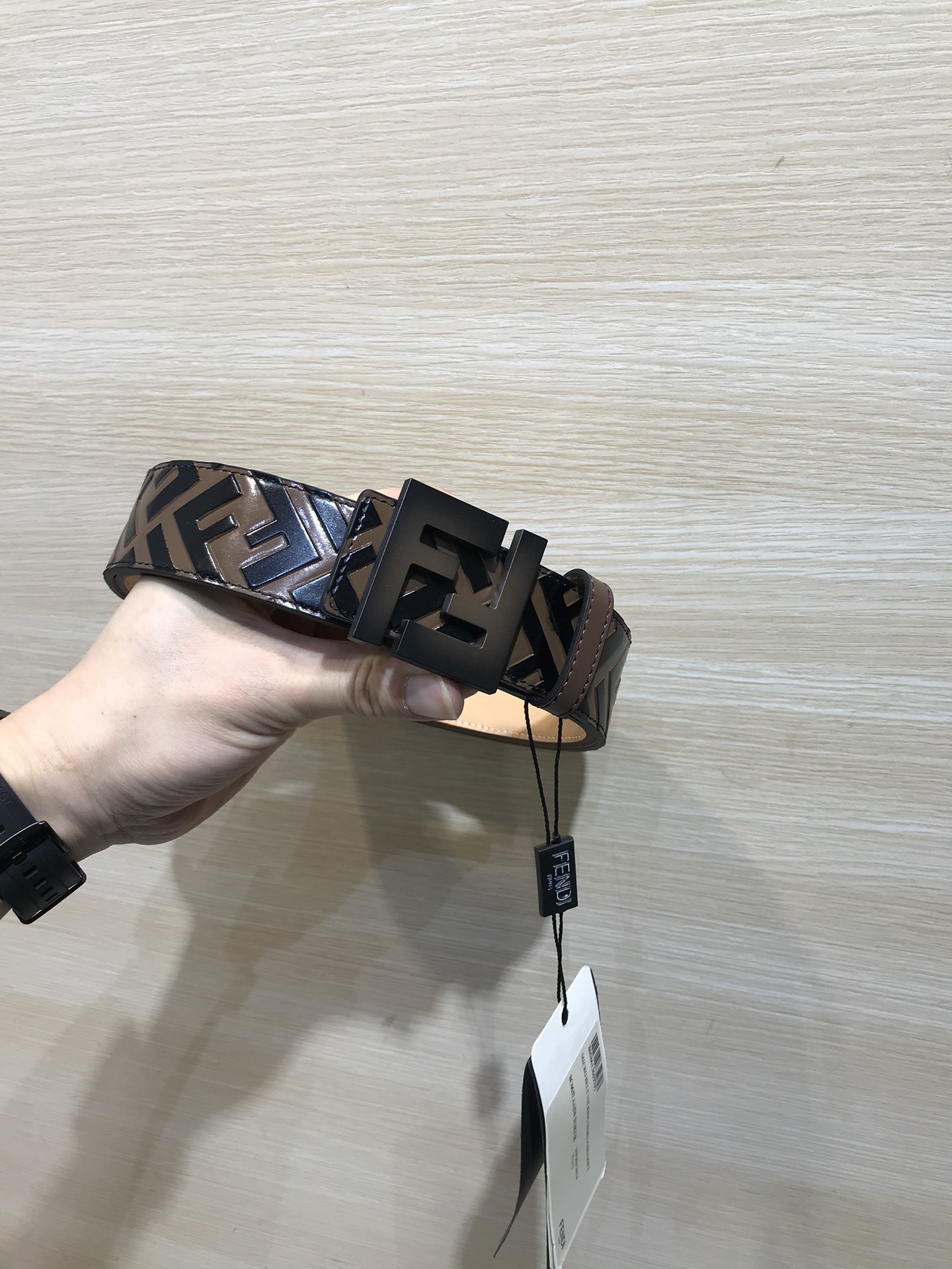 Bagsaaa F**di FF belt in brown leather with a black-finish metal FF logo