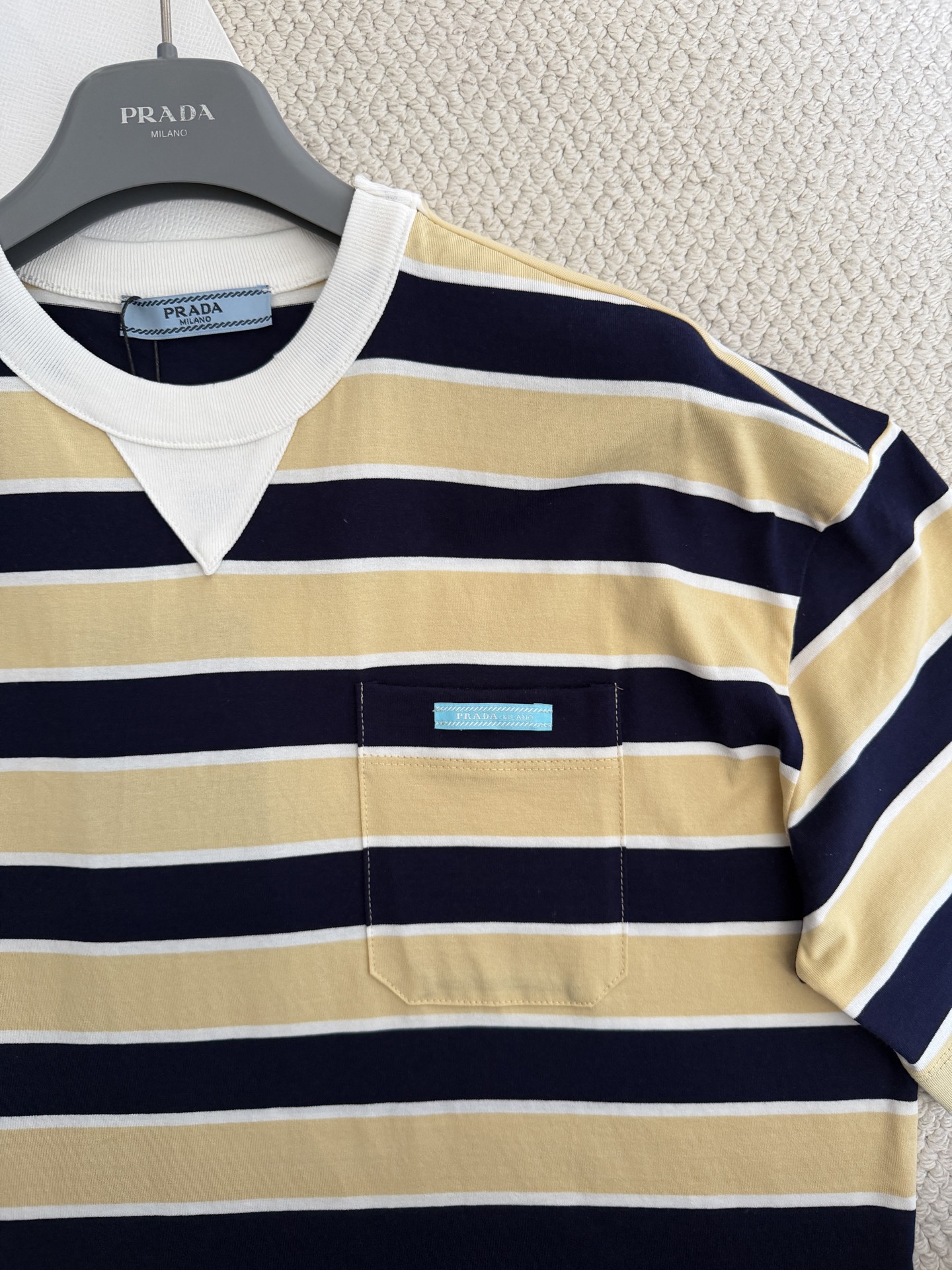 Bagsaaa Pra*a striped cotton lisle T-shirt in cream and navy blue