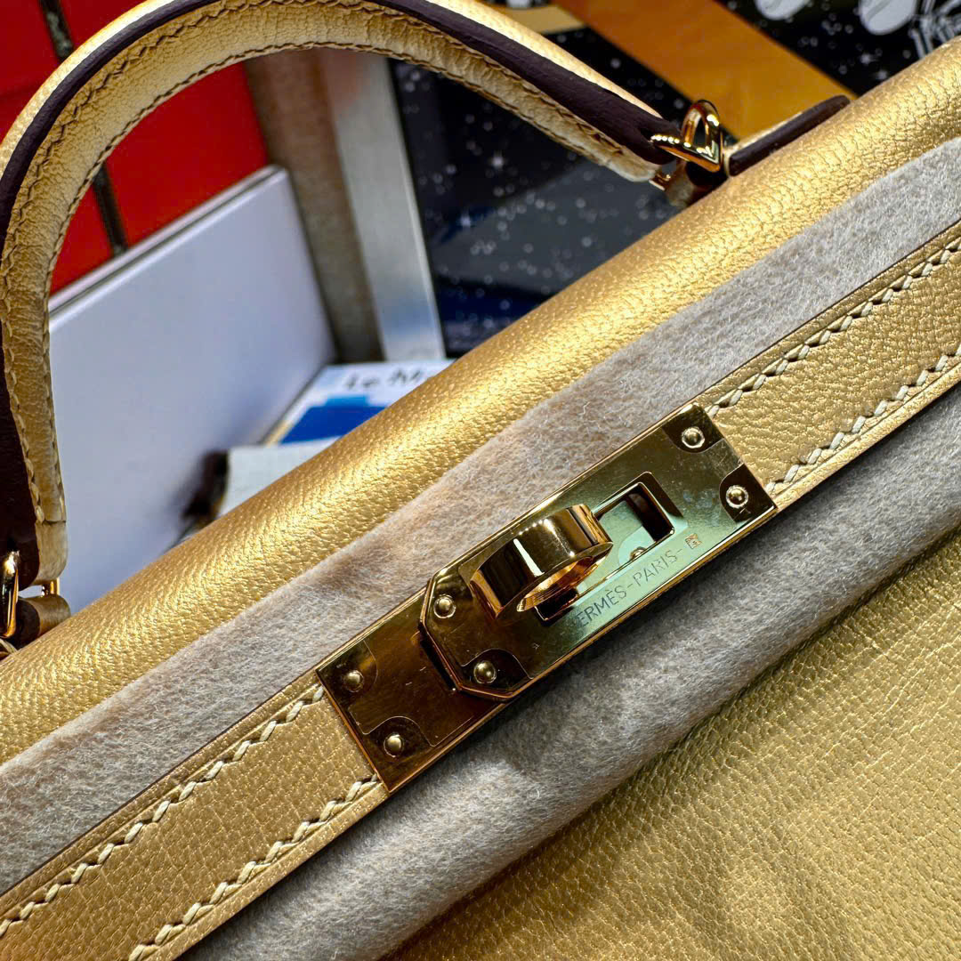 Bagsaaa H**me5 mini kelly II generation Y9 gold - 19cm